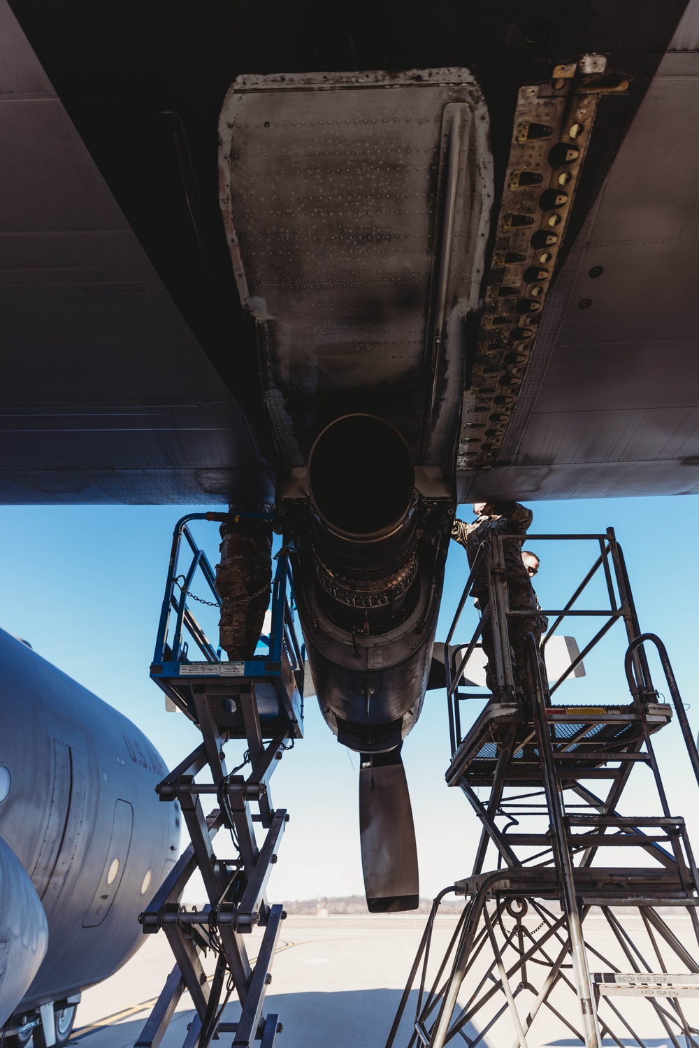 Airmen reassemble a C-130 Hercules engine