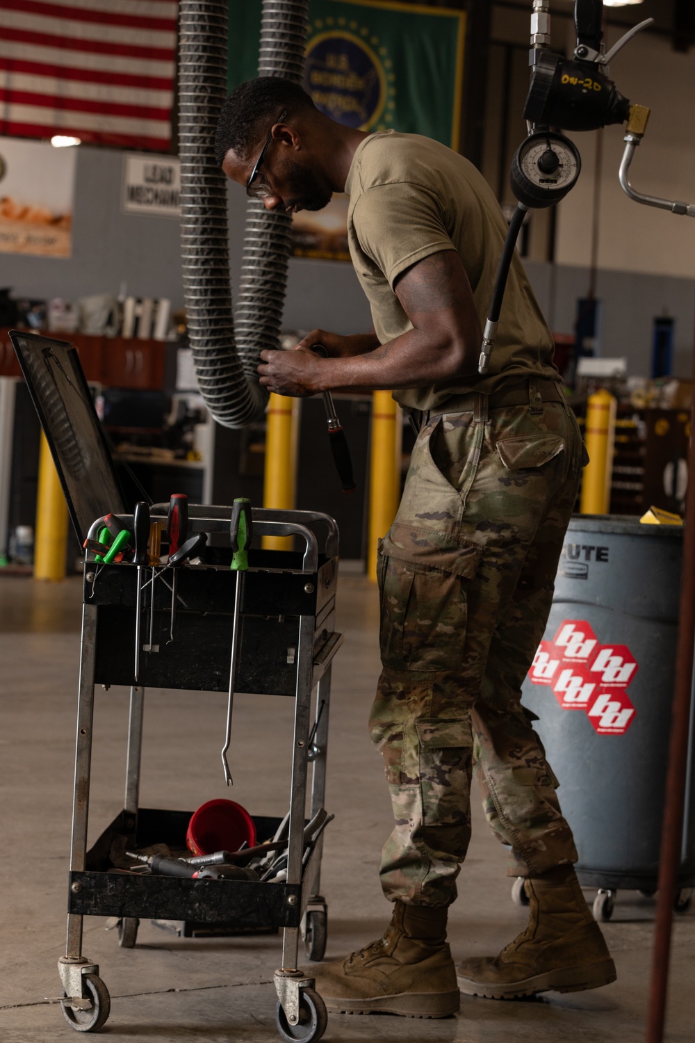 U.S. Soldiers conduct maintenance on CBP vehicles