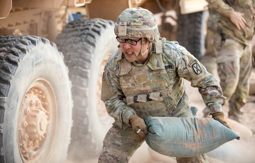 Intelligence Officer Powers Through Sandbag Lift Challenge at EPFA, Al Tanf Garrison