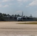 U.S. Marine Corps MV-22B Osprey and U.S. Navy C-130T Hercules aircraft provide assault support to Marines with MWSS-272