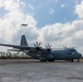 U.S. Marine Corps MV-22B Osprey and U.S. Navy C-130T Hercules aircraft provide assault support to Marines with MWSS-272