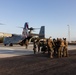 U.S. Marine Corps MV-22B Osprey and U.S. Navy C-130T Hercules aircraft provide assault support to Marines with MWSS-272