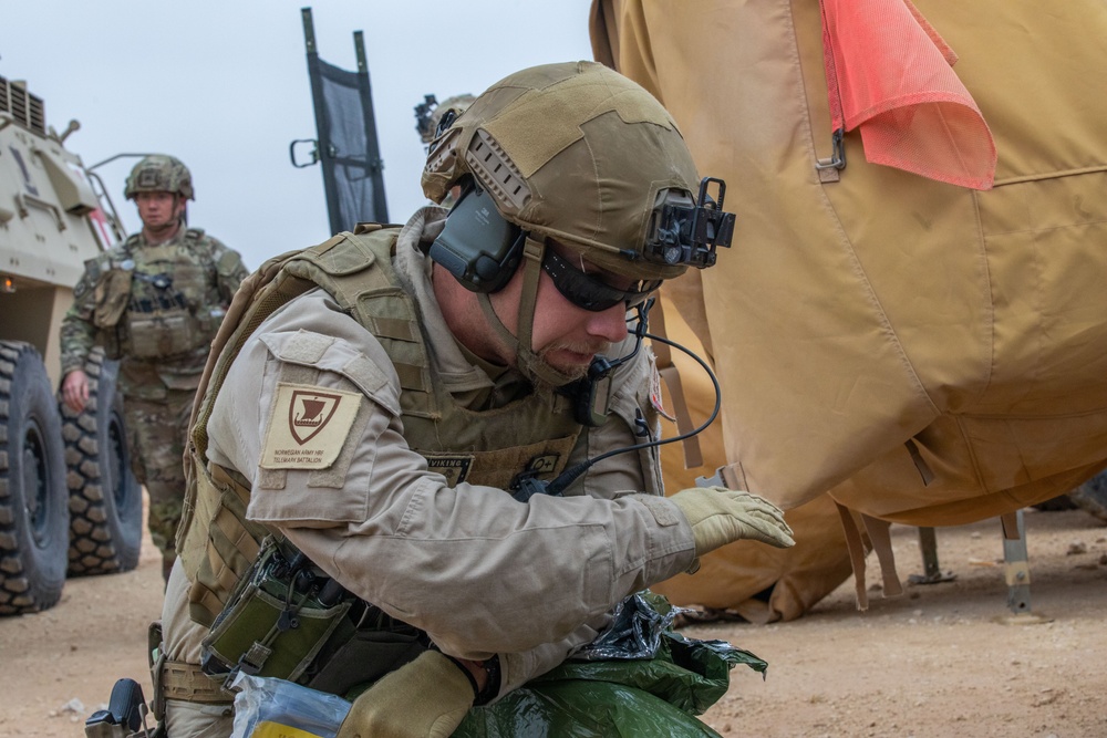 QRF, Firefighters, and EOD Conduct Joint Base Defense Exercise at AAAB