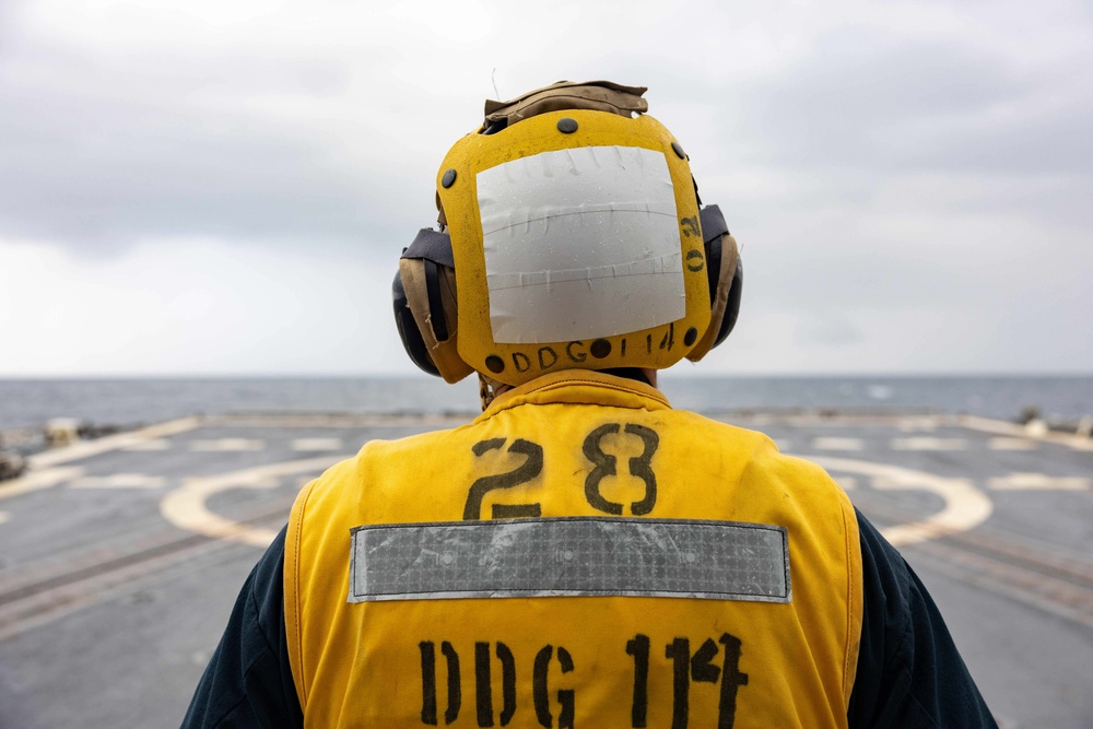 DDG 114 conducts flight operations with HSC 4