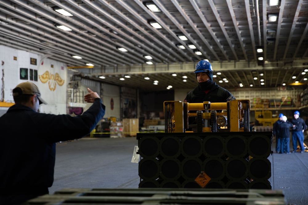 Iwo Jima Sailors Onload Ammo at NWSE