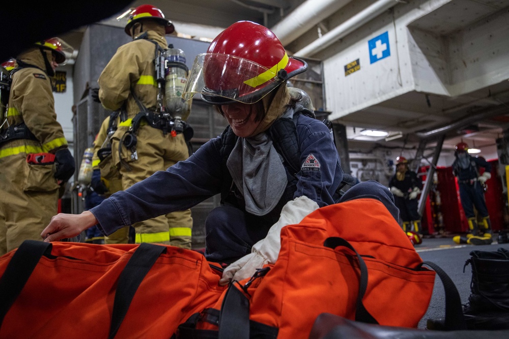 USS Ronald Reagan (CVN 76) Sailors participate in a damage control training drill