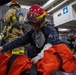 USS Ronald Reagan (CVN 76) Sailors participate in a damage control training drill