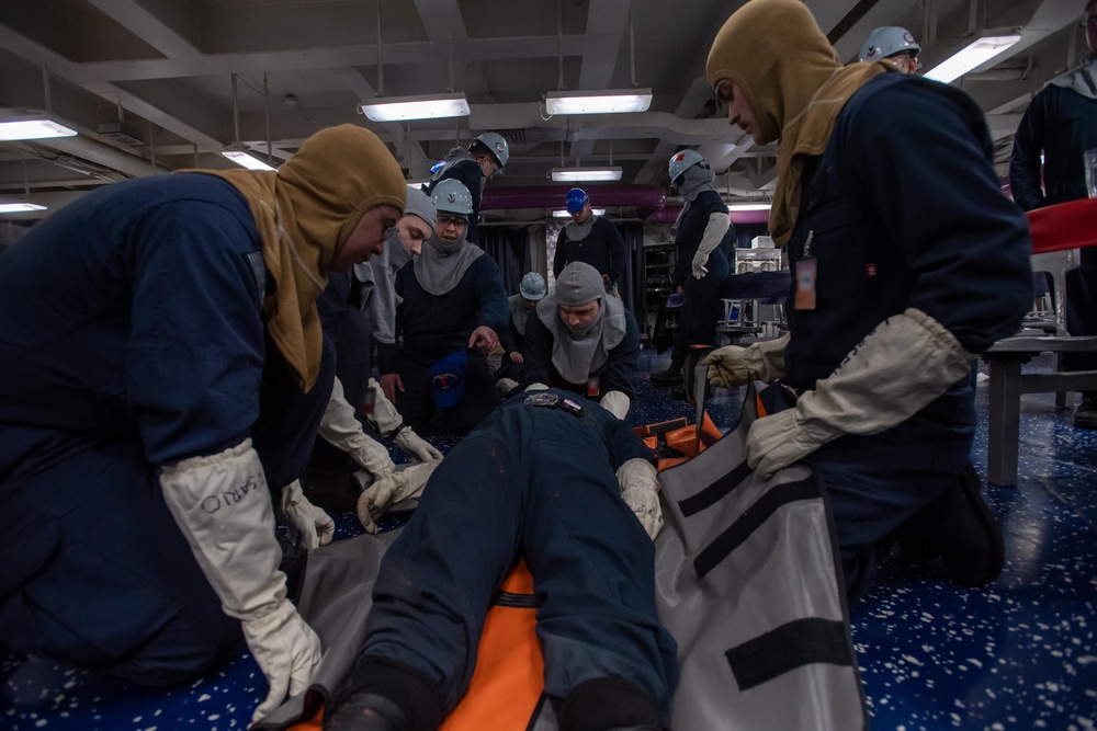 USS Ronald Reagan (CVN 76) Sailors participate in a damage control training drill