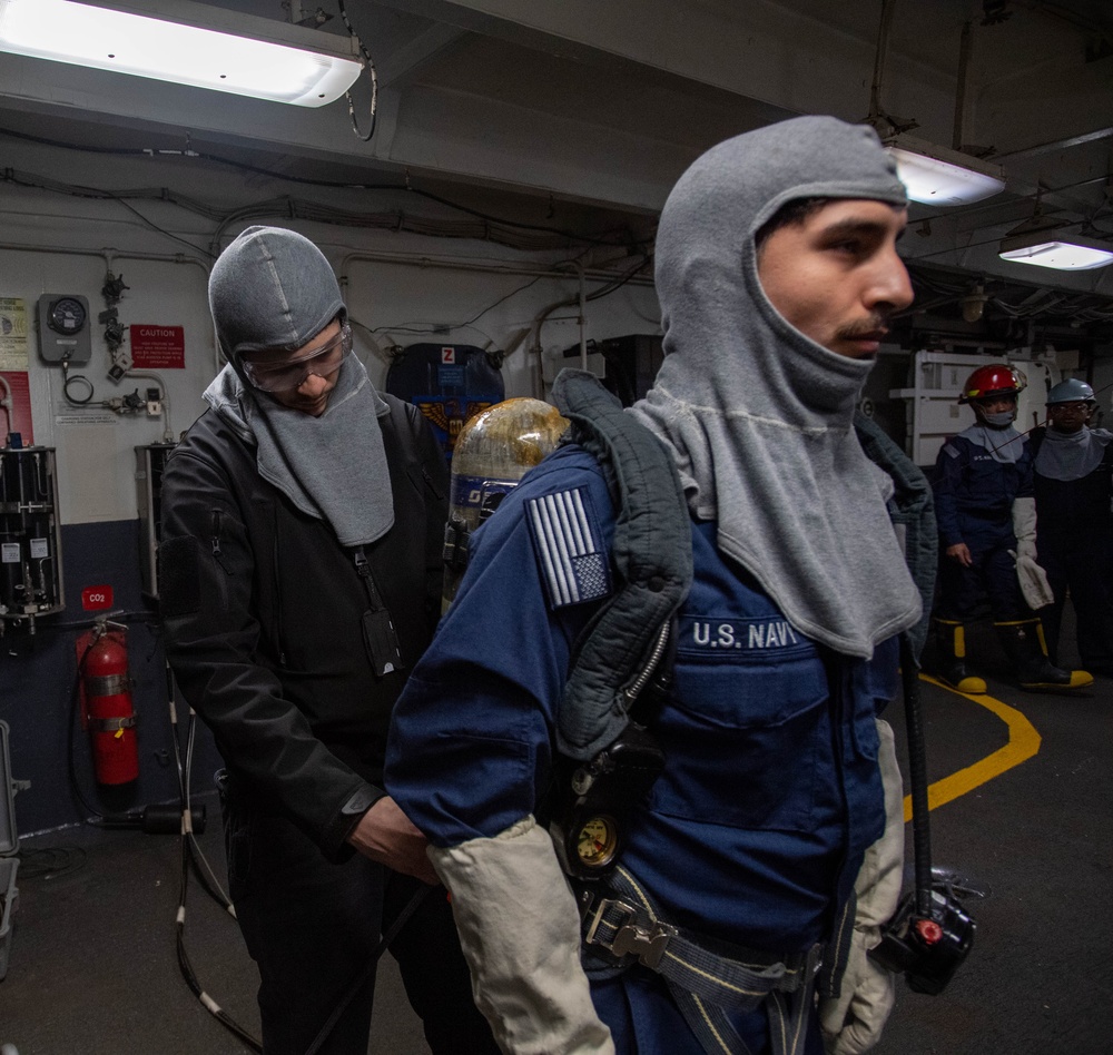 USS Ronald Reagan (CVN 76) Sailors participate in a damage control training drill