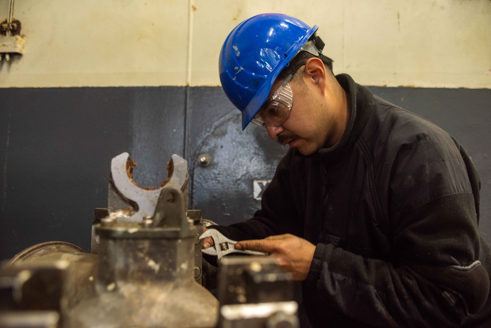 USS Ronald Reagan (CVN 76) performs maintenance and inventories equipment