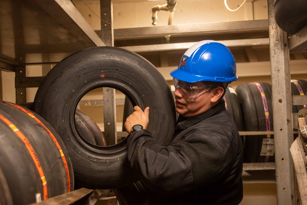 USS Ronald Reagan (CVN 76) performs maintenance and inventories equipment