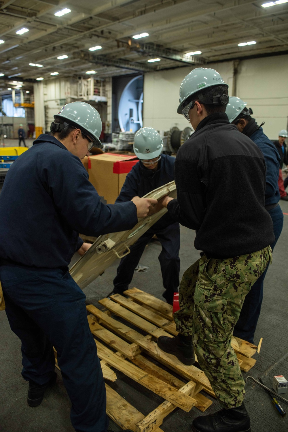 USS Ronald Reagan (CVN 76) conducts door maintenance