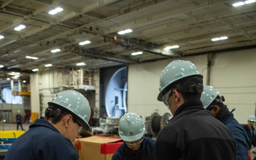 USS Ronald Reagan (CVN 76) conducts door maintenance