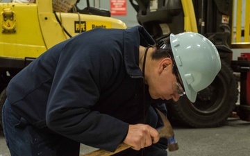 USS Ronald Reagan (CVN 76) conducts door maintenance