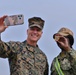 Marine Brigadier General Collins congratulates Navy Sailors on USNS Dahl