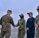 Marine Brigadier General Collins congratulates Navy Sailors on USNS Dahl