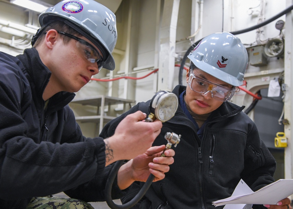 USS Ronald Reagan (CVN 76) Sailors perform maintenance