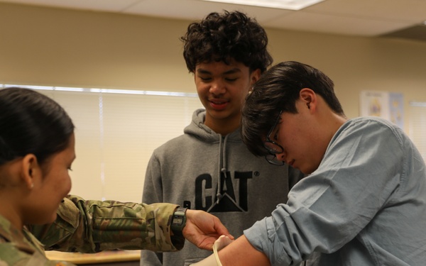 River Ridge High Schoolers meet combat medics of 62nd MDE, 250th FRST