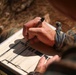 Taking the Trenches: AIMC students conduct trench assault