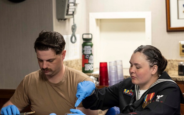 McFaul Sailors Prepare Meals for Local Mobile Community