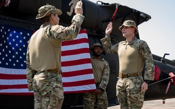 U.S. Air Force Tech. Sgt. Zachary Quicke is given the oath of reenlistment in Thailand, during Joint Exercise Cobra Gold 25