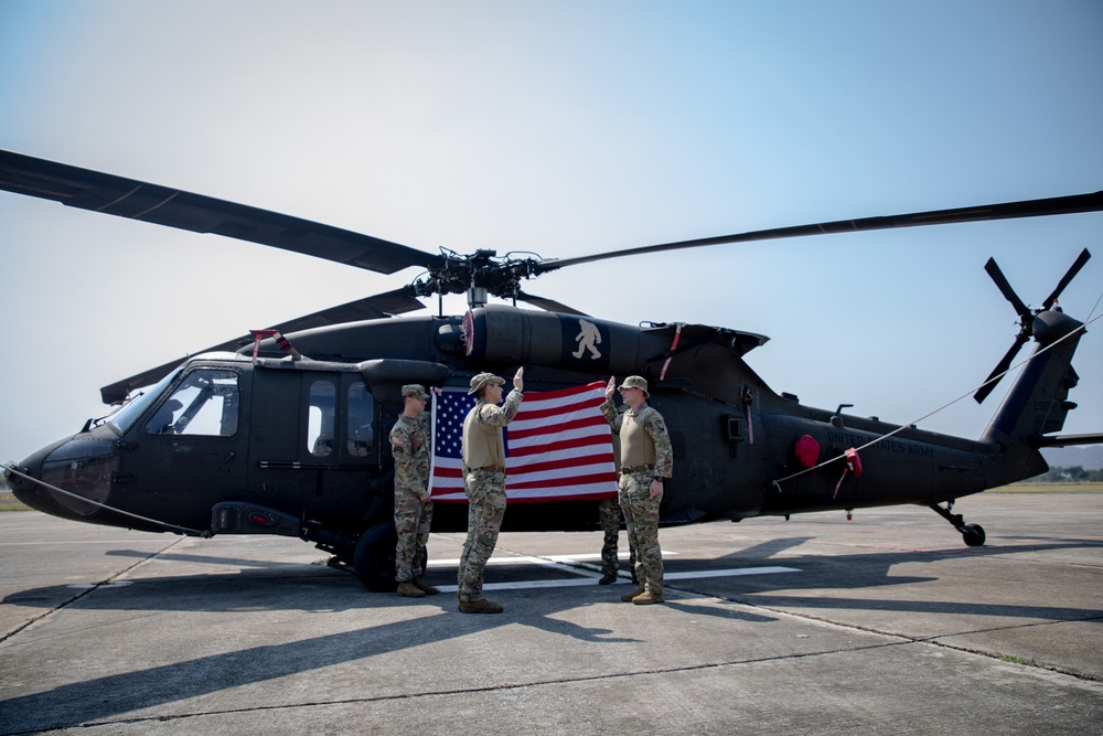 U.S. Air Force Tech. Sgt. Zachary Quicke is given the oath of reenlistment in Thailand, during Joint Exercise Cobra Gold 25