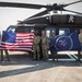 U.S. Air Force Tech. Sgt. Zachary Quicke takes the oath of reenlistment in Thailand, during Joint Exercise Cobra Gold 25