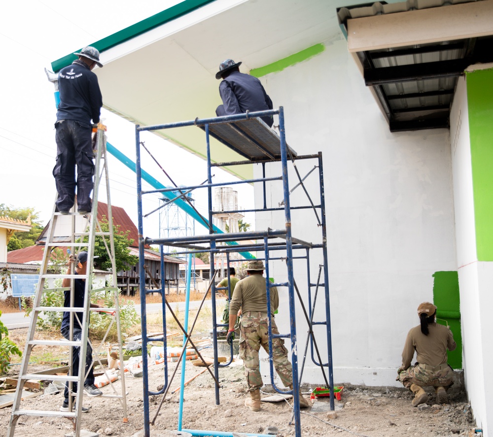 U.S. Air Force Airmen participate in the building of a school near Lop Buri, Thailand, during Joint Exercise Cobra Gold