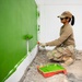 U.S. Air Force Senior Airman Antonio Leizeveil Vann participates in the building of a school near Lop Buri, Thailand