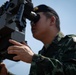 A member of the Royal Thai Armed Forces prepares for a Stinger/Starstreak engagement near Lop Buri, Thailand