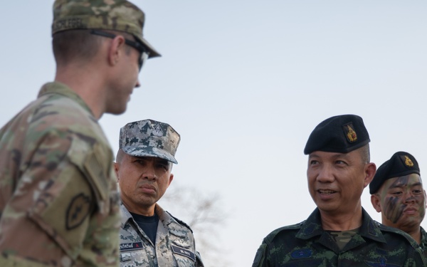 Cdr. Maj. Gen. Kosu and Maj. Gen. Surasee of the Thai Army Air Defense Division supervises the training landing zone with U.S. Army Officers