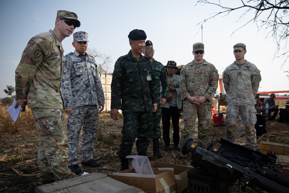 Cdr. Maj. Gen. Kosu and Maj. Gen Surasee of the Thai Army Air Defense Division supervise the training landing zone with U.S. Army officers