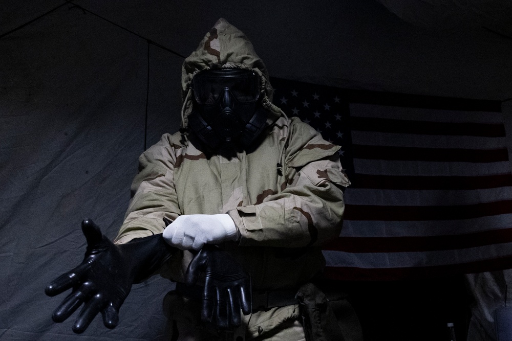QUART 25.2: Marines and Sailors with the 11th MEU conduct a CBRN defense drill