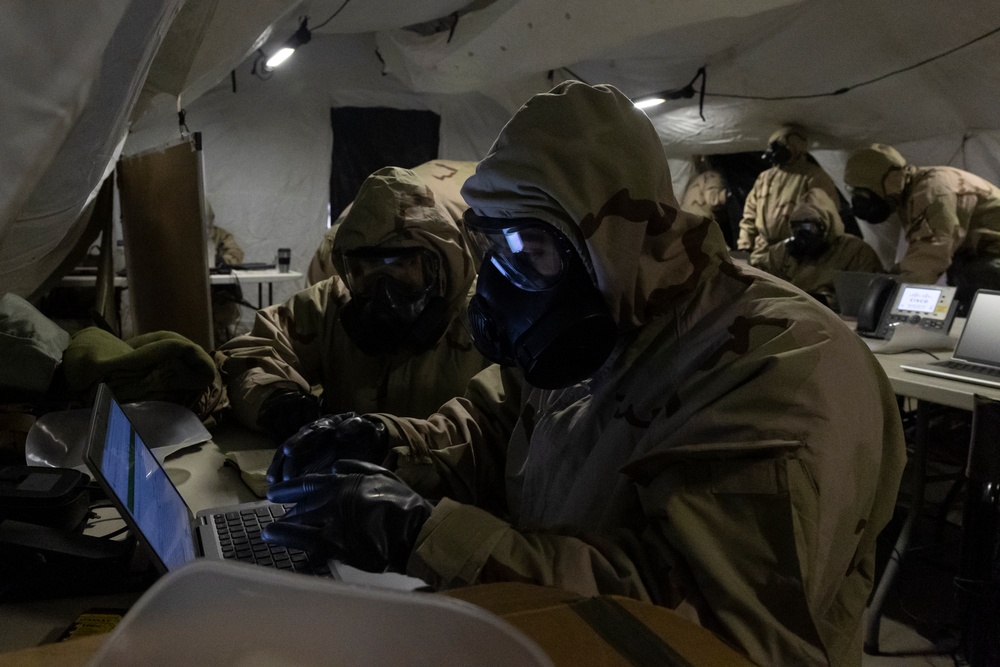 QUART 25.2: Marines and Sailors with the 11th MEU conduct a CBRN defense drill
