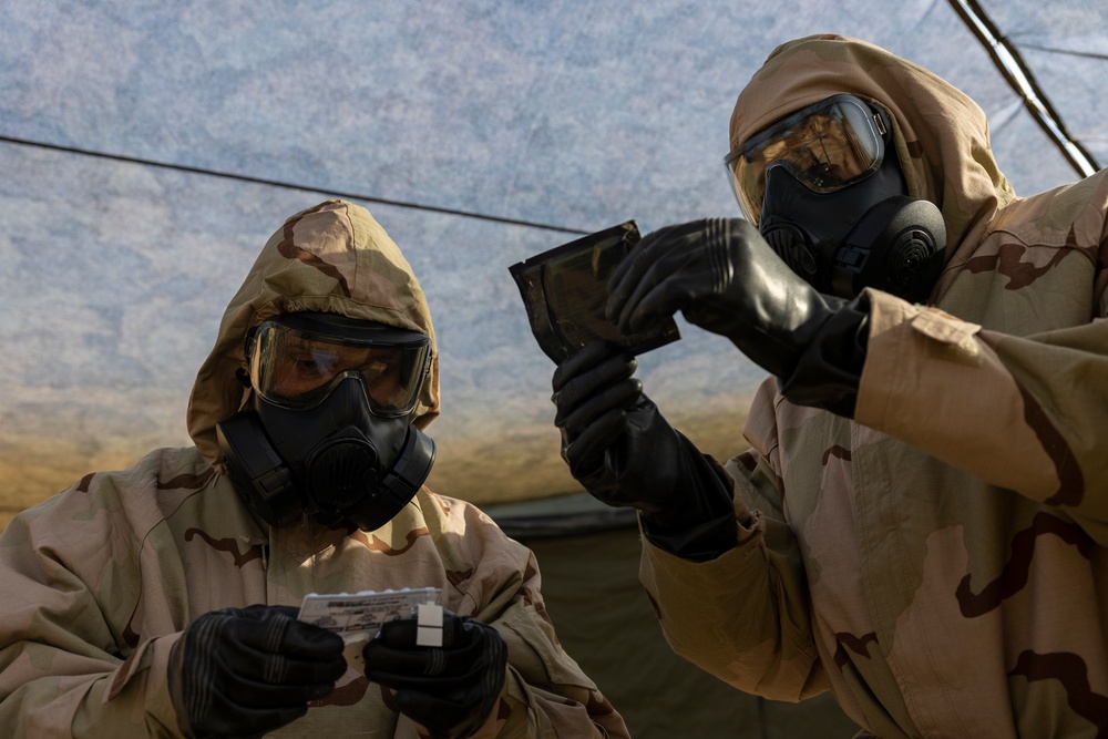 QUART 25.2: Marines and Sailors with the 11th MEU conduct a CBRN defense drill