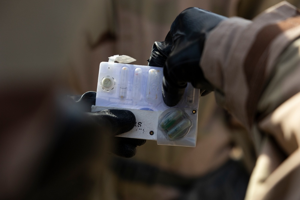 QUART 25.2: Marines and Sailors with the 11th MEU conduct a CBRN defense drill