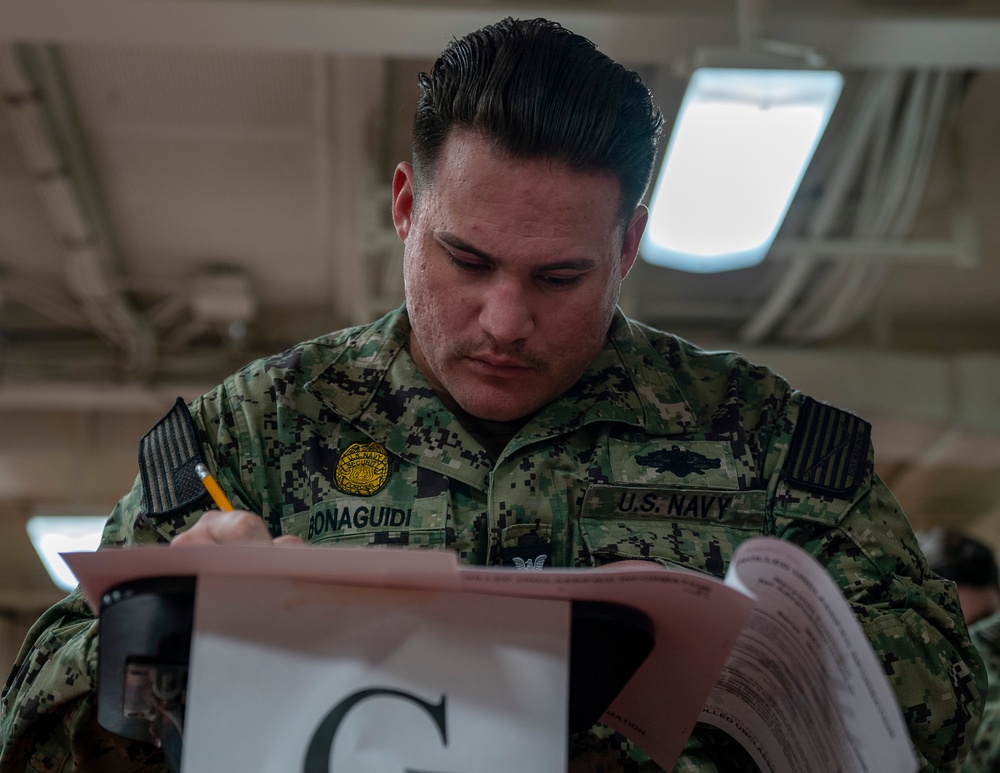 Tripoli sailor take advancement exam