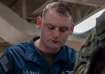 Tripoli sailor take advancement exam