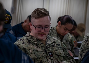 Tripoli sailor take advancement exam