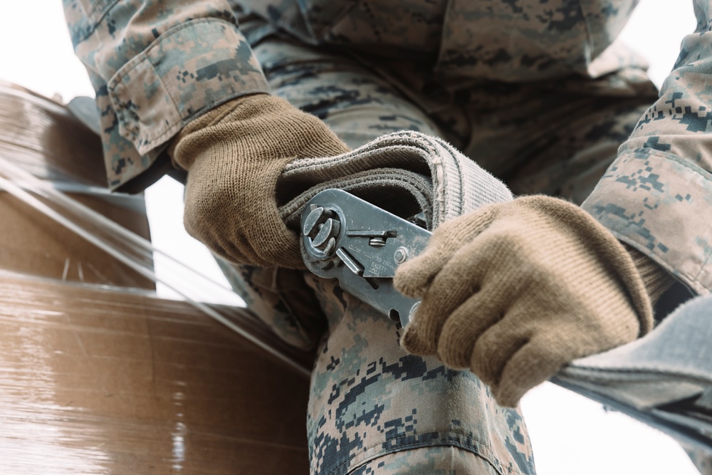 Marines with CLB-6 Transport Cargo During MTX 2-25