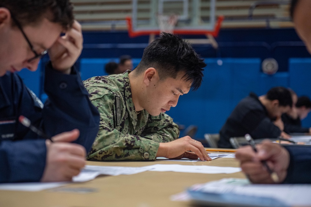 USS Ronald Reagan (CVN 76) Sailors take Navy-wide E-6 advancement exam