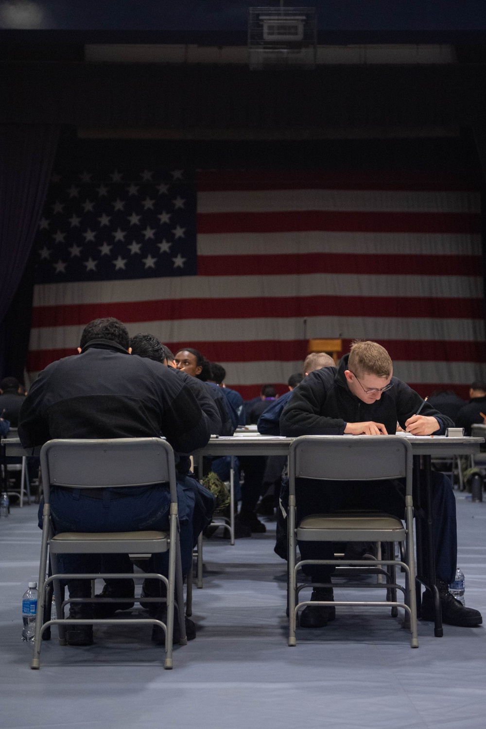 USS Ronald Reagan (CVN 76) Sailors take Navy-wide E-6 advancement exam