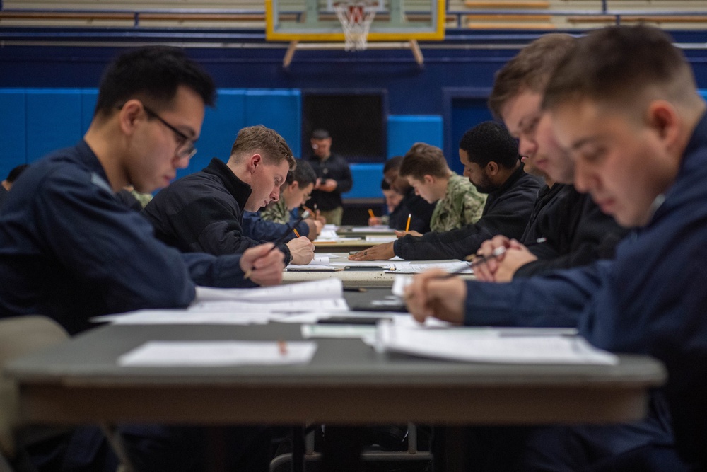 USS Ronald Reagan (CVN 76) Sailors take Navy-wide E-6 advancement exam