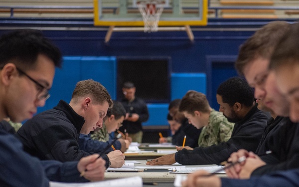 USS Ronald Reagan (CVN 76) Sailors take Navy-wide E-6 advancement exam