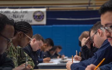 USS Ronald Reagan (CVN 76) Sailors take Navy-wide E-6 advancement exam