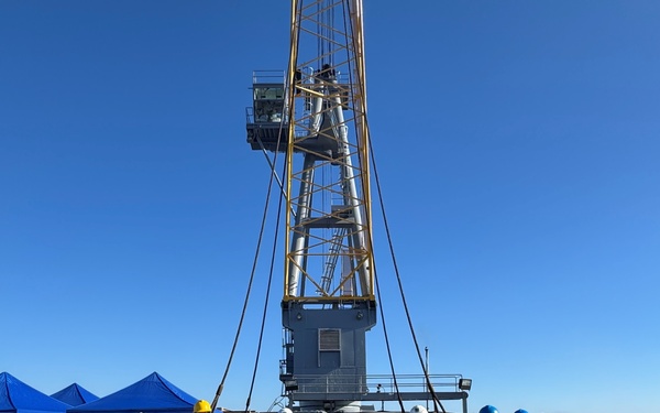NAVFAC YD-254 floating crane crew and US Navy divers.