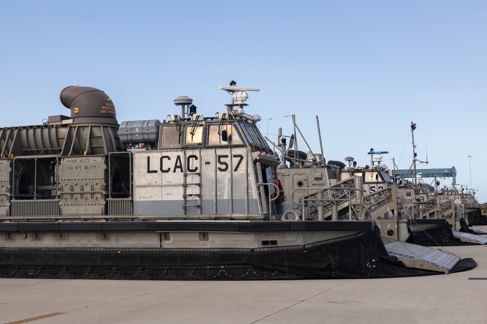 QUART 25.2: Marines and Sailors perform LCAC drills with HIMARS