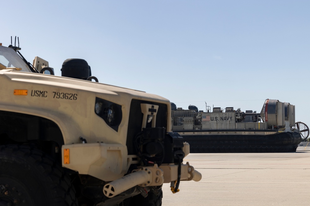 QUART 25.2: Marines and Sailors perform LCAC drills with HIMARS