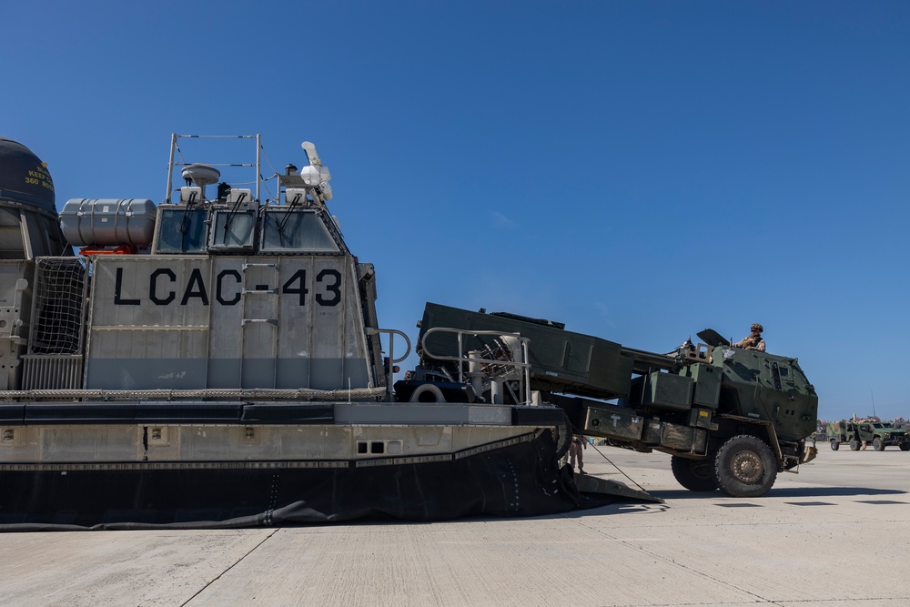 QUART 25.2: Marines and Sailors perform LCAC drills with HIMARS