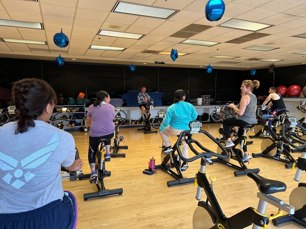 349 MSG commander leads fitness spin class